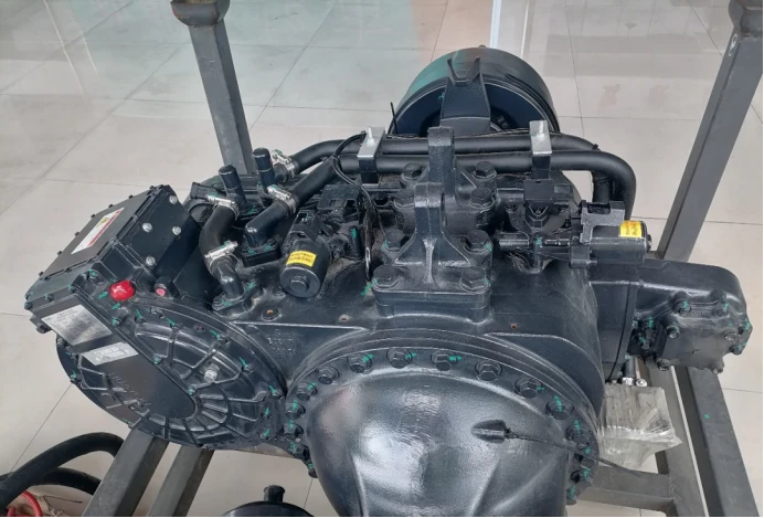 newly developed electric drive axle with the motor on the left, transmission in the center, and PTO on the right newly developed electric drive axle with the motor on the left, transmission in the center, and PTO on the right